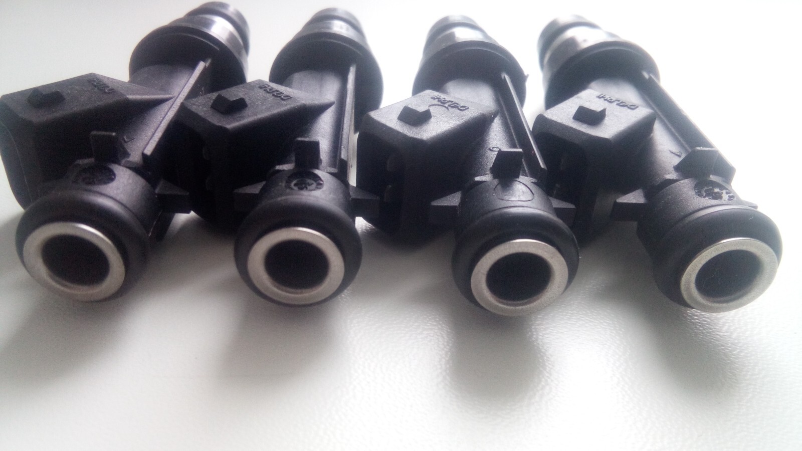 Injectors Opel 1.6 Astra Zafira Z16XEP DELPHI 25343299 set