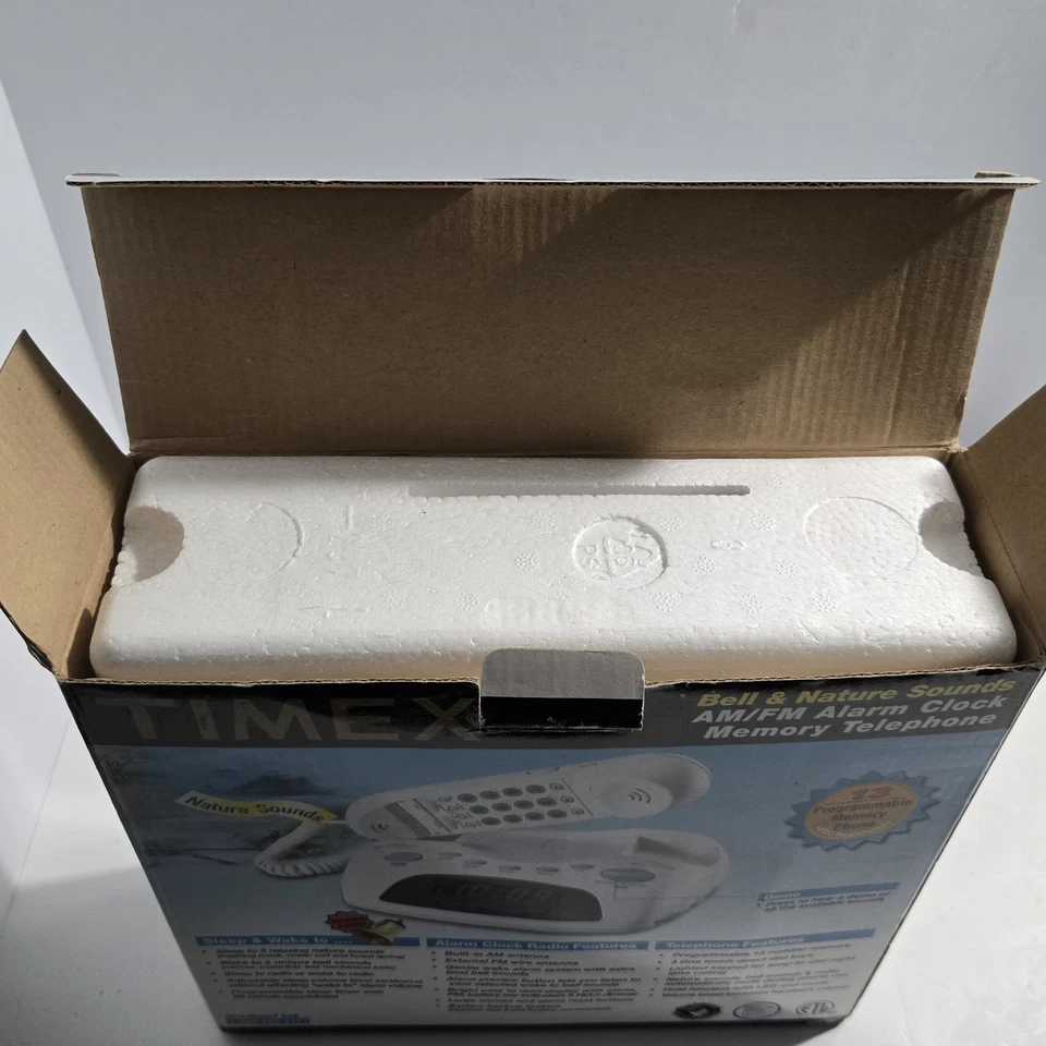 Teléfono con memoria Timex vintage y reloj despertador AM/FM campana blanca y teléfono natural Foto 2 de 4