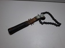 Alter Ölfilterschlüssel mit Fahrradkette 