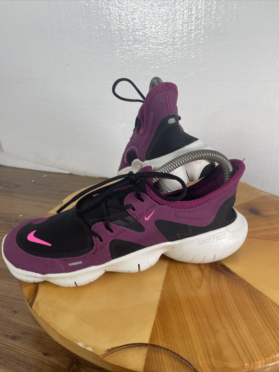 nike running free run flyknit trainers in berry