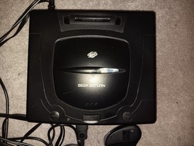 Sega Saturn Controller And Daytona Usa(no case) also includes manuals