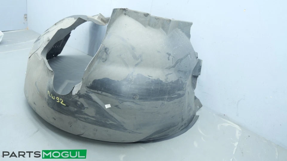 Guardabarros interior delantero izquierdo Jaguar XF 2010-2019 revestimiento protector contra salpicaduras OEM AW93-166563 Foto 3 de 4