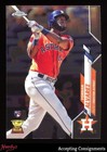 2020 Topps Chrome #200 Yordan Alvarez rookie card showing him in orange Astros jersey with white pants and RC logo.