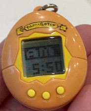 Chino Tamagotchi Orange 20th Anniversary edition WORKS