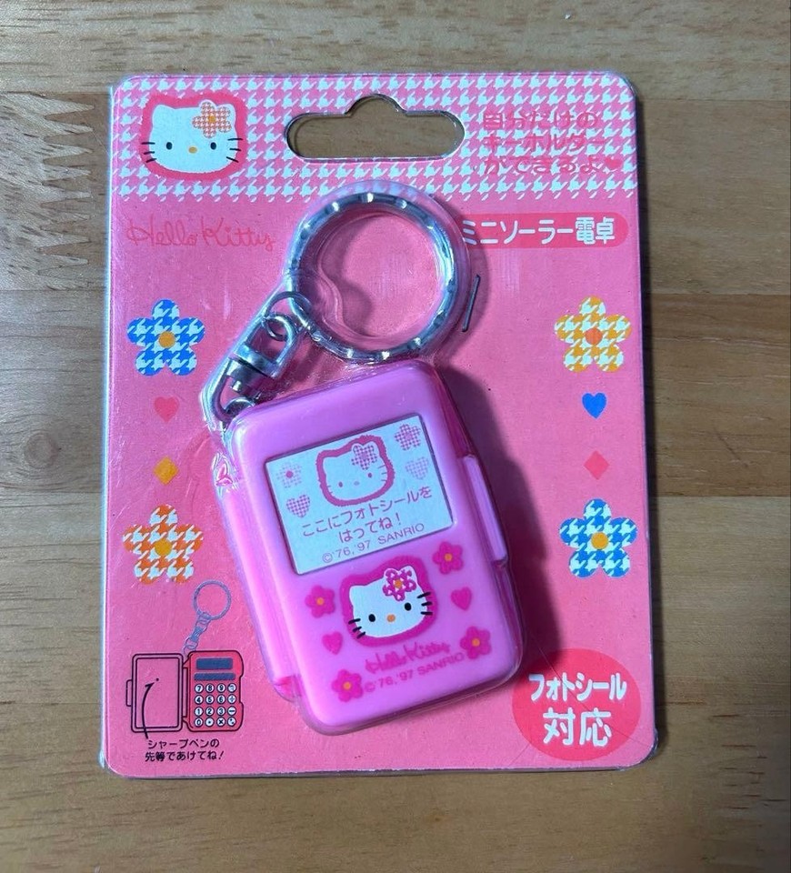 A 1997 Hello Kitty solar-powered mini calculator — a fully functional piece of rare Sanrio history that's as cute as it is nerdy.