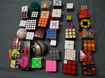 rubiks cube lot of 40 some new others used. twisty puzzle brain teaser