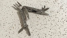 Leatherman Rev Silver Stainless Steel Multi Tool Linerlock Knife ,Pliers,Opener