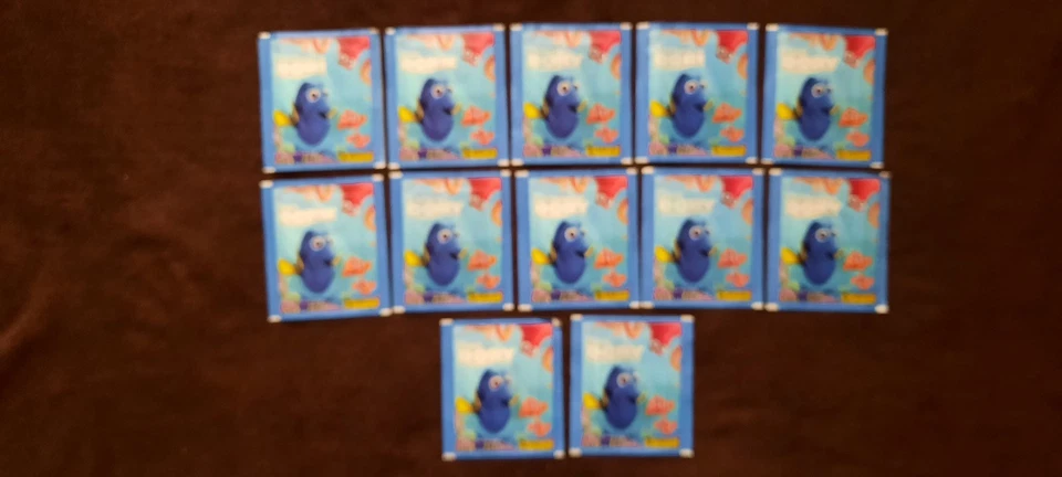 12 pochettes stickers LE MONDE DE DORY - PANINI -2016 -- - Photo 1/1