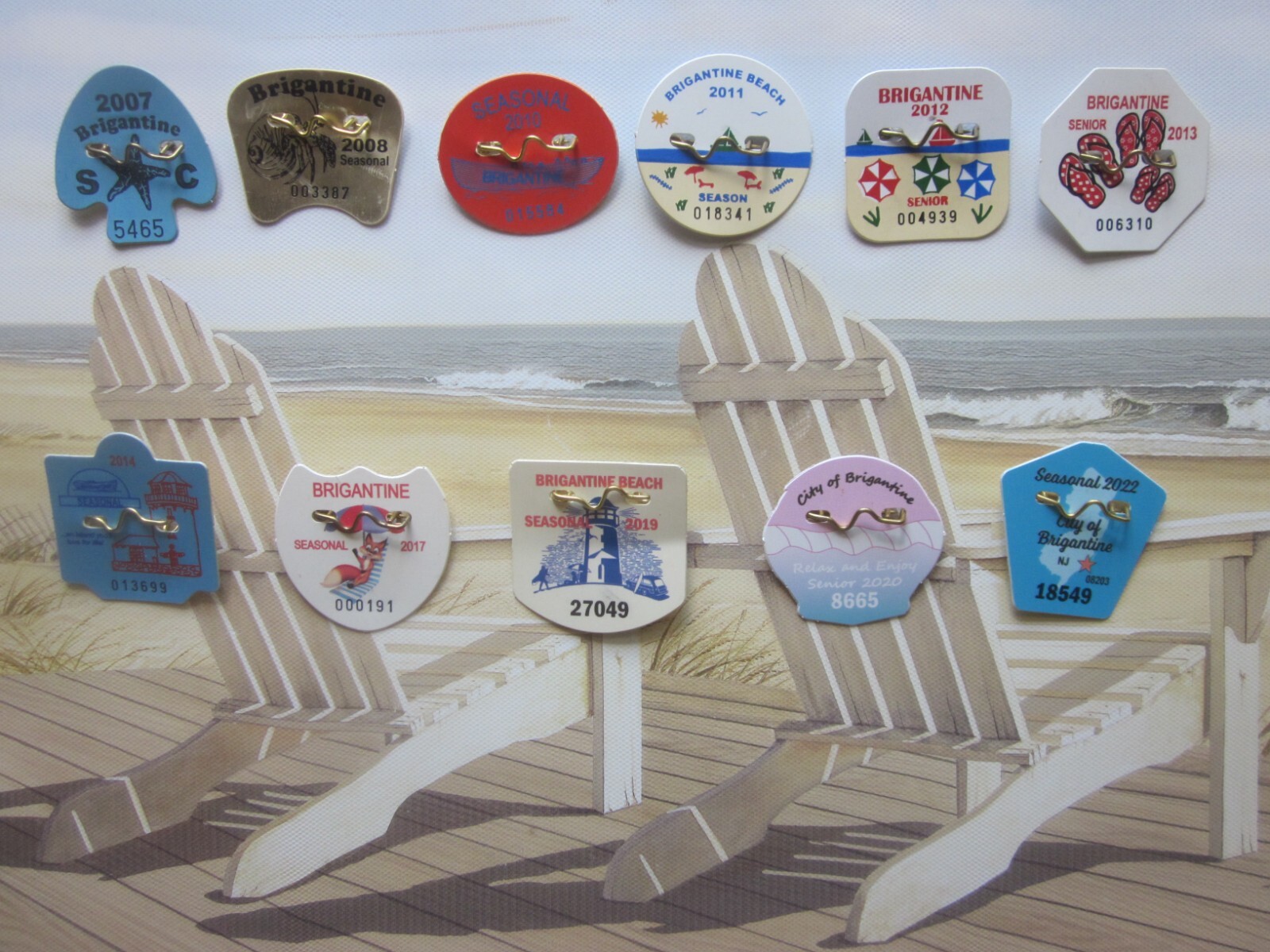 11 YEARS BRIGANTINE NEW JERSEY SEASONAL BEACH BADGES/TAGS eBay