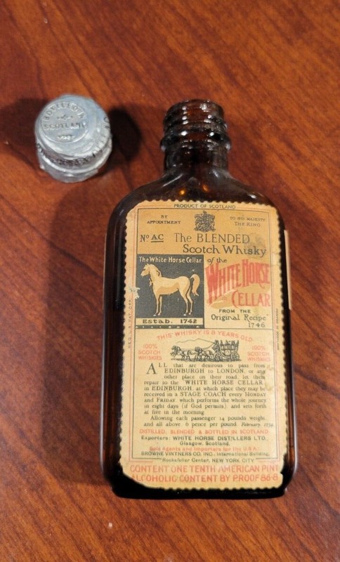 Vintage,  1938 , 1/10 pint, White Horse Scotch Empty bottle w/original lead cap.