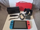 Lot Console Nintendo Switch HAC-001 rouge fluo et bleu avec accessoires