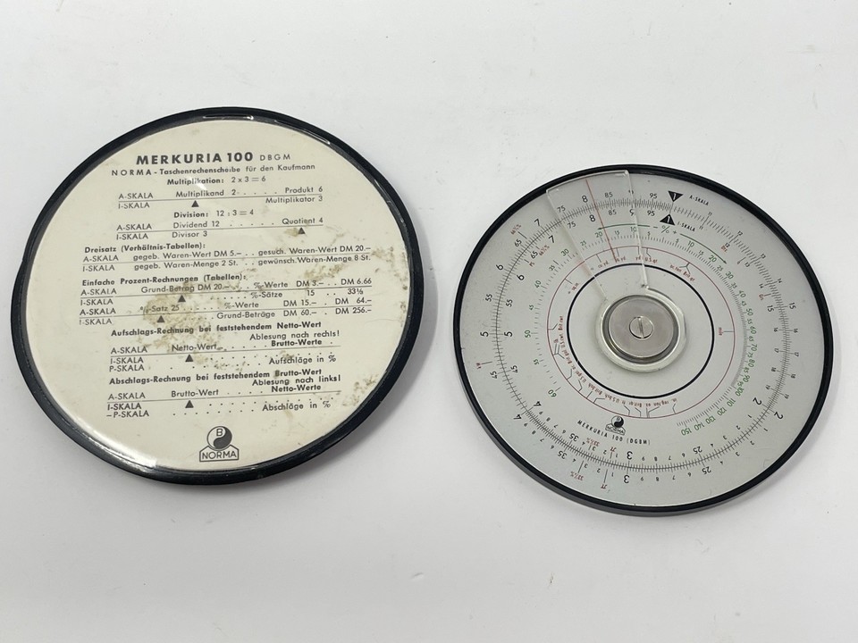 A Cold War-era German circular slide rule by Merkuria — the analog computer of its day, still beautiful and functional as a desk object.