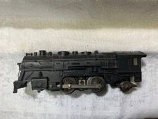 A really nice unbroken Marx 1666 steam chest smoking engine. Runs great!