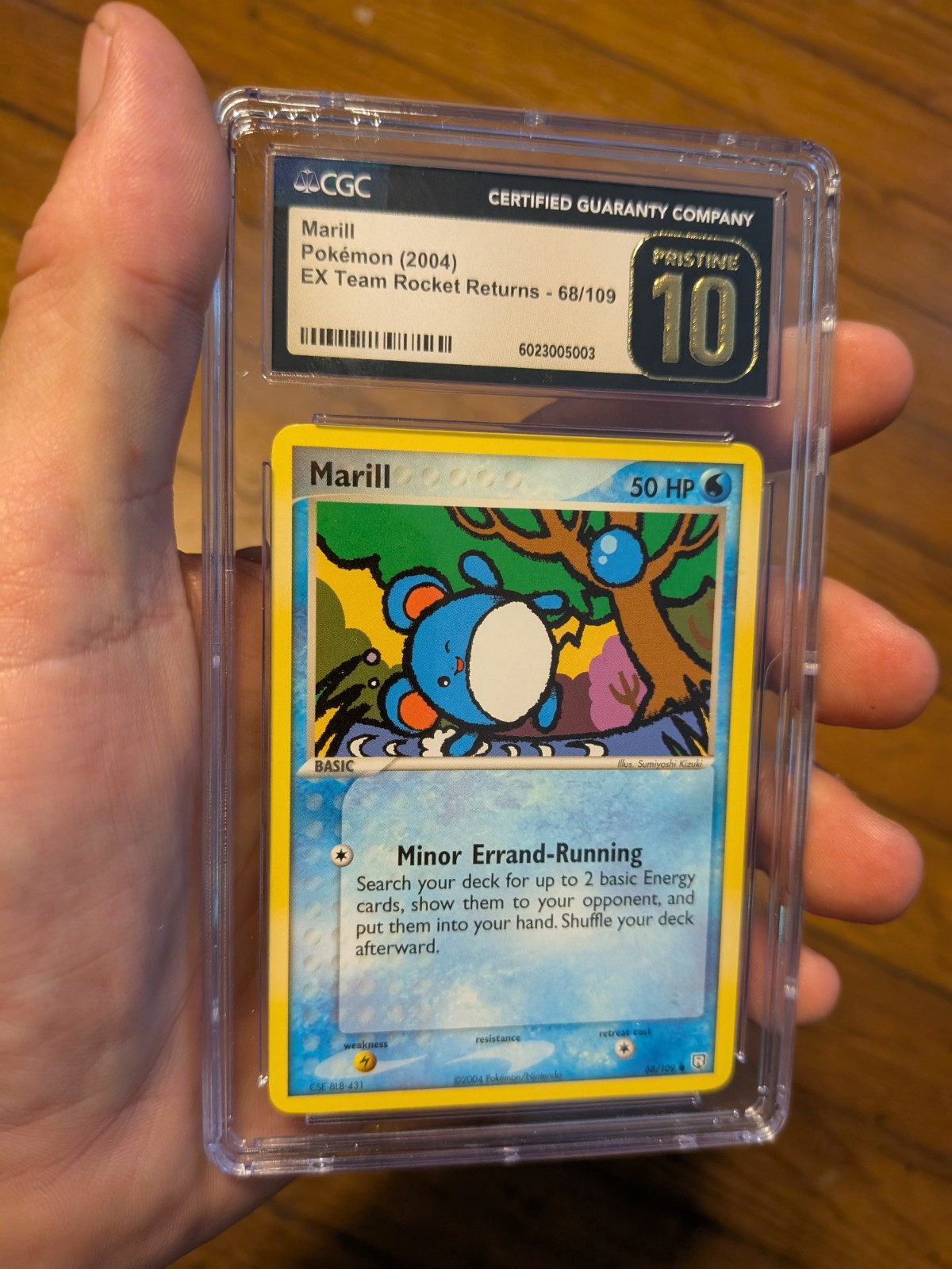 (POP 4) CGC 10 PRISTINE Marill 68/109 EX Team Rocket Returns 2004 Pokemon Card