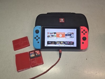 Nintendo Switch Console Red/ Blue  w/ case & 3 Games