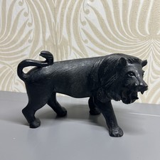 Hand carved black wood lion statue 10.5” x 7”