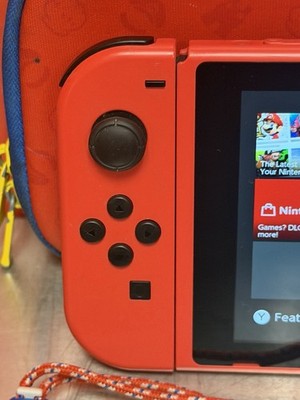 Nintendo Switch Super Mario Odyssey Edition (with Red Joy-Cons