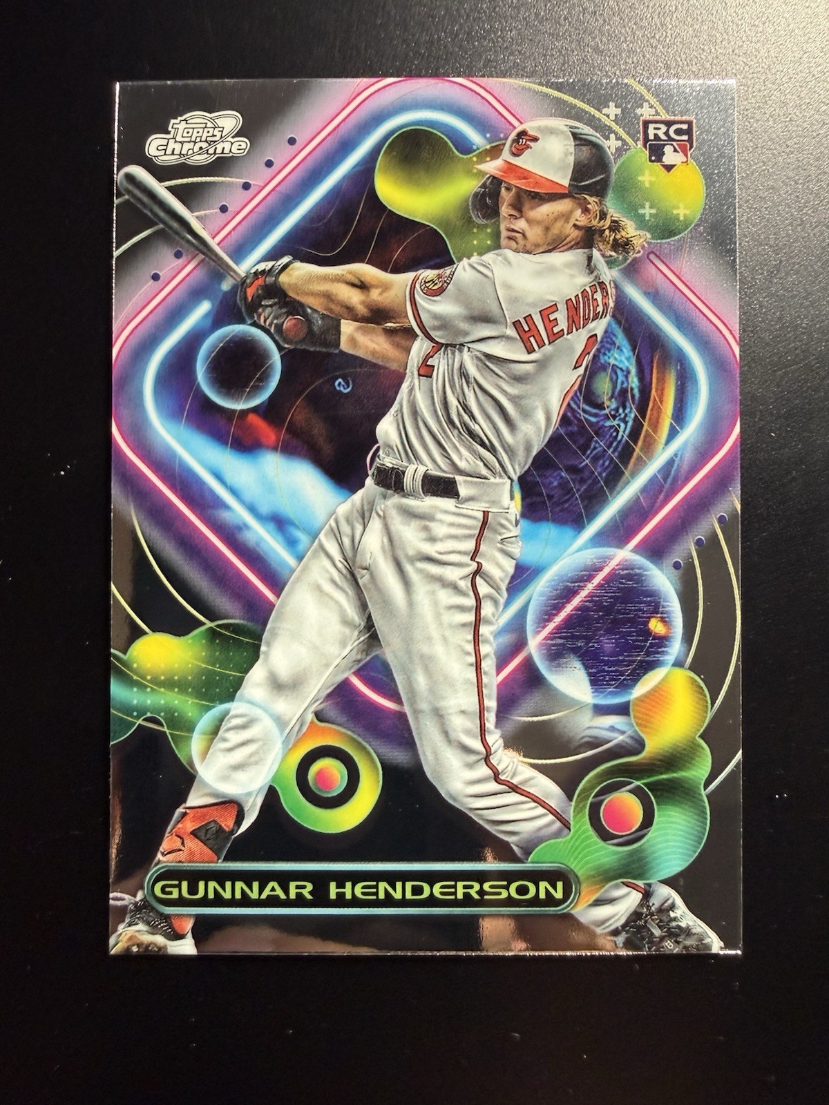 Gunnar Henderson #2 Baseball Cards 2023 Topps Cosmic Chrome trading card — raw and PSA graded price guide