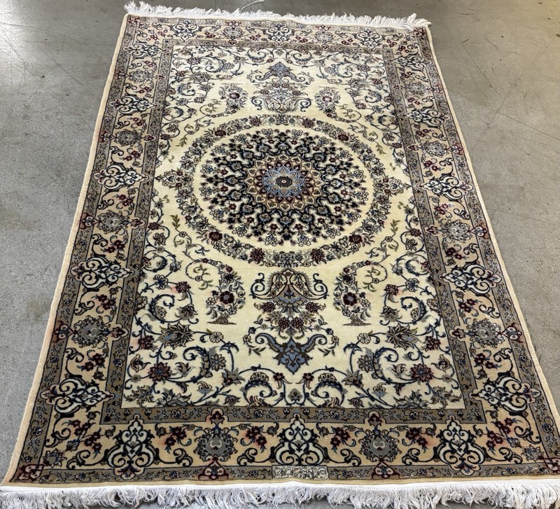 AN AWESOME  SIGND NAEEIN HAND WOVEN RUG