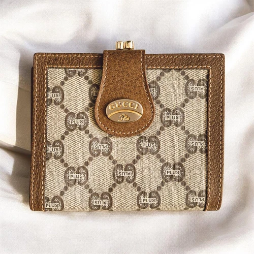 Authentique portefeuille Gucci couleur marron motif GG femme L10,5 cm H10,5 cm G1,5 cm