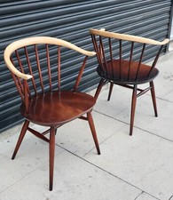 Pair of Ercol 449a stained Elm and Beech cowhorn carver dining chairs