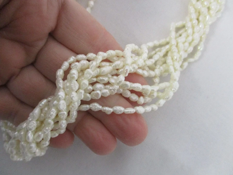 COLLAR VINTAGE DE PERLAS DE AGUA DULCE DE 10 HEBRAS con broche de oro amarillo de 14K 16 1/2" Foto 2 de 4