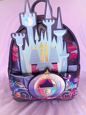 disney cinderella castle series mini backpack EXCLUSIVE DROP: Loungefly Night Scene Glow Mi LF Lounge VIP Loungefly Disney Cinderella Castle Series Mini Backpack Loungeflys Disney Cinderella Castle Mini Backpack brings the magic of Cinderellas ball gown transformation and royal ball excitement to life for your wardrobe Disney Cinderella Castle Danielle Nicole