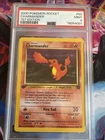 1st Edition Charmander 50/82 - Team Rocket - PSA 9 Mint