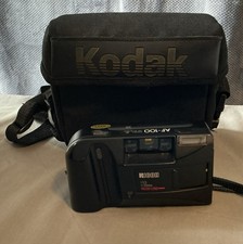 RICOH AF-100 35 MM CAMERA WITH A KODAK CARRYING CASE .untested.