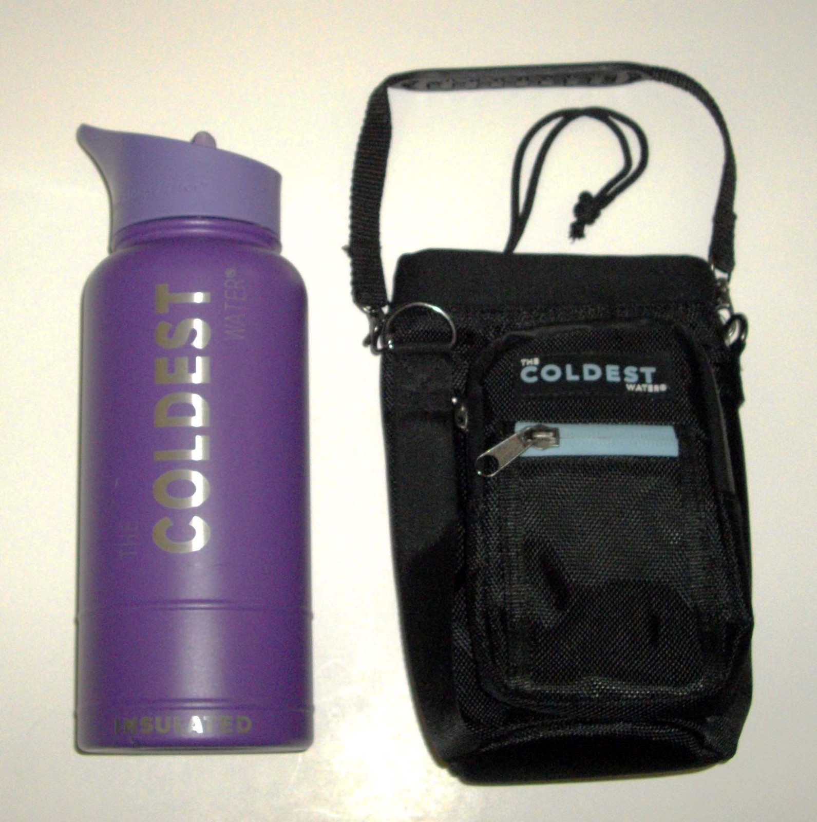 The Coldest Water Purple 24 Oz Sport Bottle with Pocketed Ca