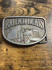 Vintage Raleigh Lights Belt Buckle Big Rig Semi Truck Trucker Apparel