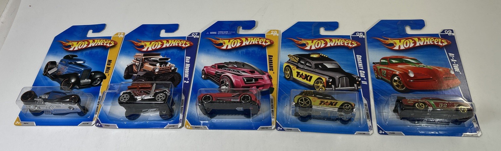 Hot Wheels 2009 Mid Mill, Bad Muddere, Cockney Cab, At-A-Tude, Barbaric Lot 5