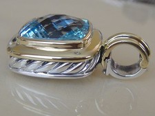 $2100. DAVID YURMAN 18K GOLD,SS LARGE ALBION BLUE TOPAZ ENHANCER.