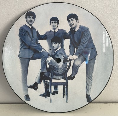 Love Me Do/PS I Love You By The Beatles 7” Blue Vinyl Picture Disc