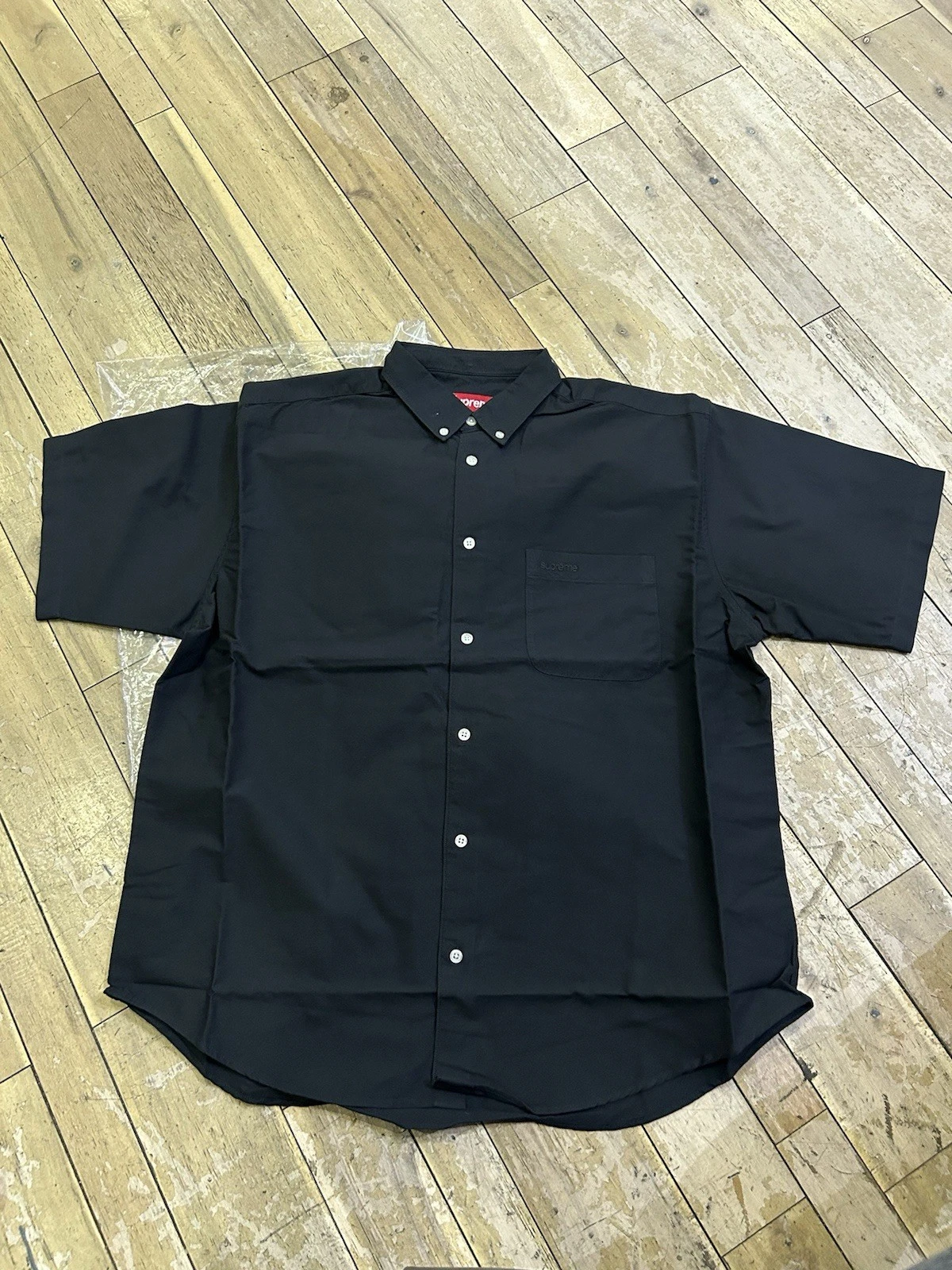 Taille L   Chemise Oxford noire à manches courtes coupe ample suprême SS24