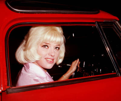 British actress Diana Dors is at the wheel of her car Historic Old Photo