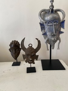 Small African brass bronze Senufo Kpelie mask pendant.    De Kolb collection