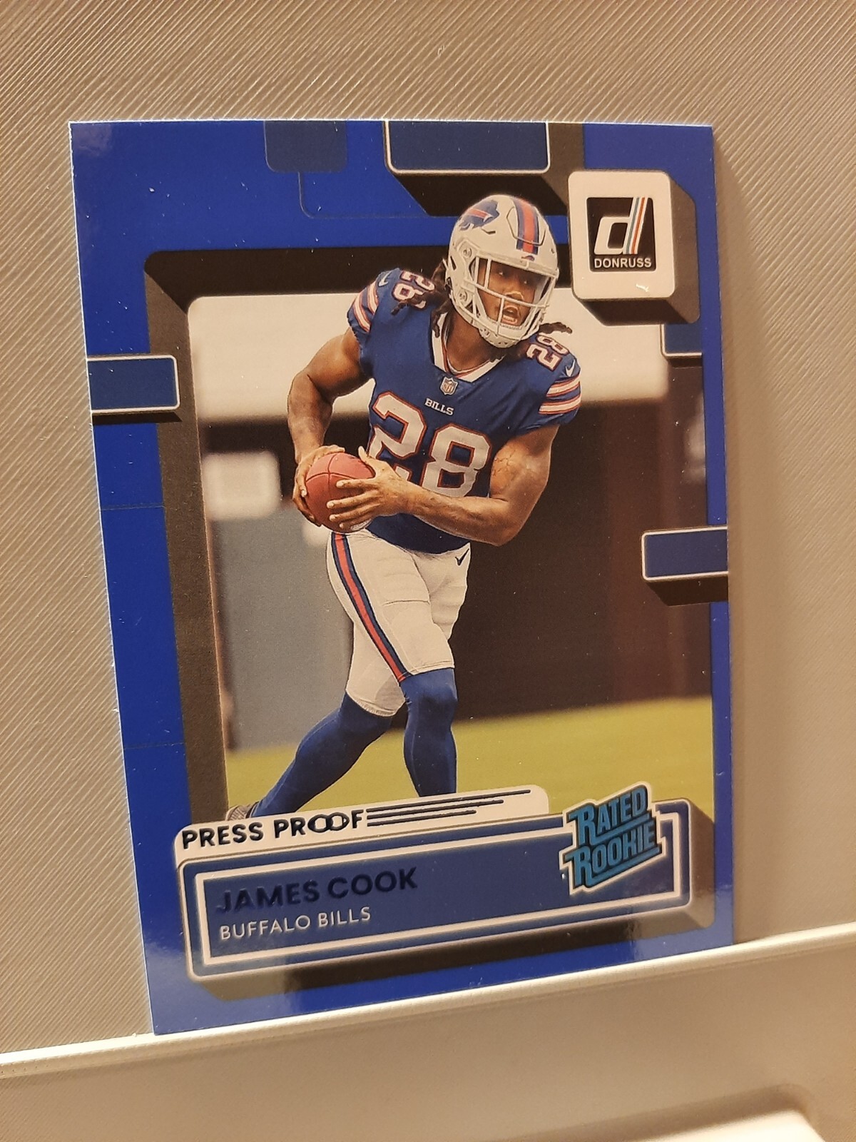 2022 Panini Donruss - Rated Rookie Press Proof Blue #315 James Cook (RC)