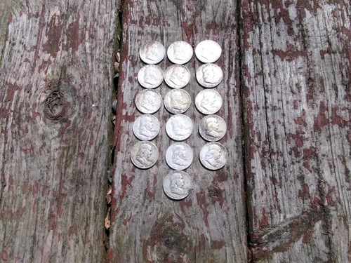 sixteen ben franklin half dollar silver coins picked at random
