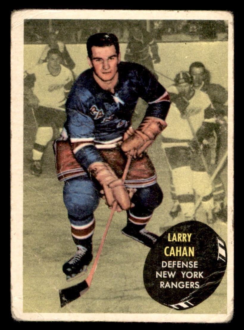 Larry Cahan #52 Hockey Cards 1961 Topps trading card — raw and PSA graded price guide