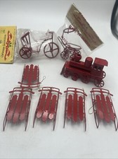 Lot Of 8 Red Metal Christmas Tree Ornaments Sleds Train Carriage Vintage