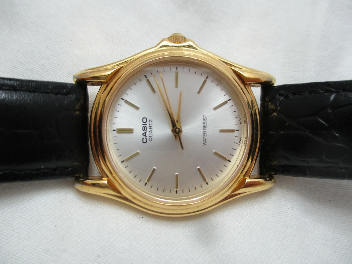 Casio Wristwatch Black Genuine Leather Buckle Band Gold Tone Face Water Resist