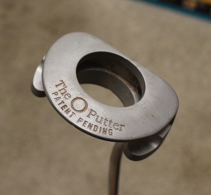 The "O" Putter. Picks the ball out of the hole !!