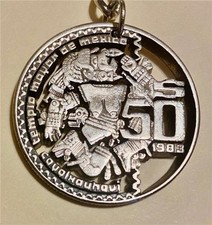 W67 …… Keychain  with a hand cut 1983 Coyolxauhqui 50.00 pesos Mexican Coin