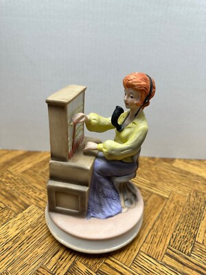 VINTAGE RED HAIR OPERATOR SPINNING MUSIC BOX FOR F.S.P INC