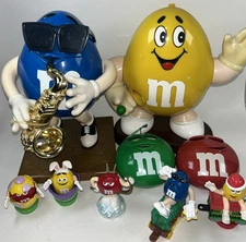 Vtg M&M Lot of 9 Candy Dispenser Saxophone Musical Ornaments Toys Easter Xmas