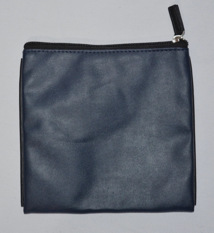 Bolsa de viaje unisex Tumi para Delta con cremallera azul marino forrada negra maquillaje usada en excelente estado Foto 3 de 4