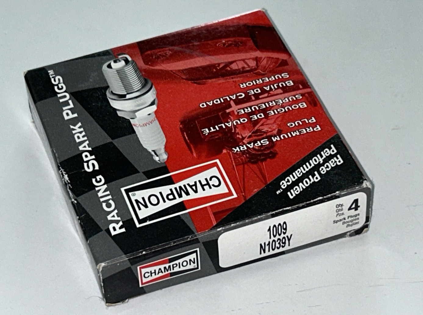 4 - Genuine Champion Racing Spark Plugs - N1039Y Stock # 1009