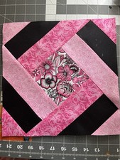 12 pink and black quilt blocks 10 1/2 in.