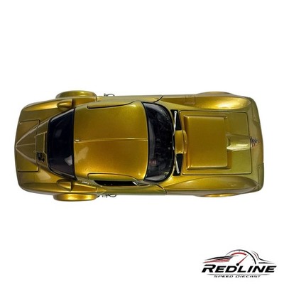 🇺🇸Exoto 1963 Chevrolet Corvette Gold Standox Suzuka Sun 1:18 D1